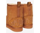SUPERDRY Mini bottes en daim Sherpa sur cosmo-lepuy.fr
