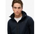 SUPERDRY Veste à capuche Softshell Trekker sur cosmo-lepuy.fr